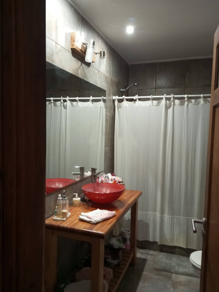 Casa sobre Av 12x50 con galpon
